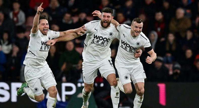 Boreham Wood midfielder Mark Ricketts (R) celebrates against Bournemouth Creator: Glyn KIRK