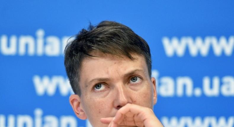 Ukrainian pilot Nadiya Savchenko looks on during a press-conference in Kiev on August 2, 2016