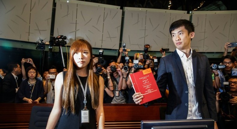 A judicial review seeking to disqualify Yau Wai-ching (L) and Baggio Leung from the legislature kicked off at Hong Kong's High Court on October 26, 2016