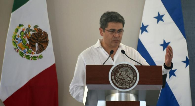 Juan Orlando Hernandez served two terms as Honduran president [AFP]