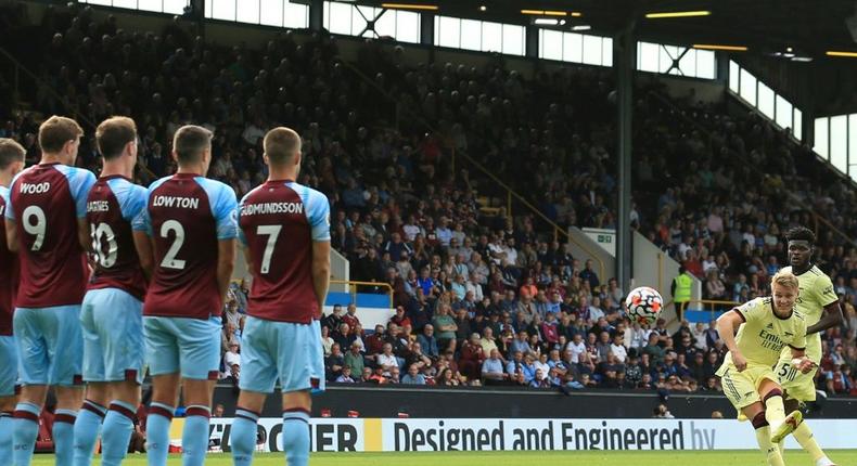 Decisive strike: Arsenal's Martin Odegaard (2nd R) scores with a free-kick in a 1-0 win at Burnley Creator: Lindsey Parnaby