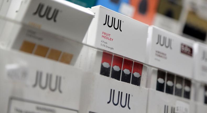 FILE - In this Dec. 20, 2018, file photo Juul products are displayed at a smoke shop in New York. On Thursday, Oct. 3, 2019, the U.S. Federal Trade Commission ordered Juul and five other vaping companies to hand over information about how they market e-cigarettes, the governments latest move targeting the industry. (AP Photo/Seth Wenig, File)