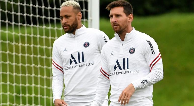 Best of enemies: Neymar and Lionel Messi trained together for Paris Saint-Germain on Monday but will be opponents on September 5 Creator: Bertrand GUAY
