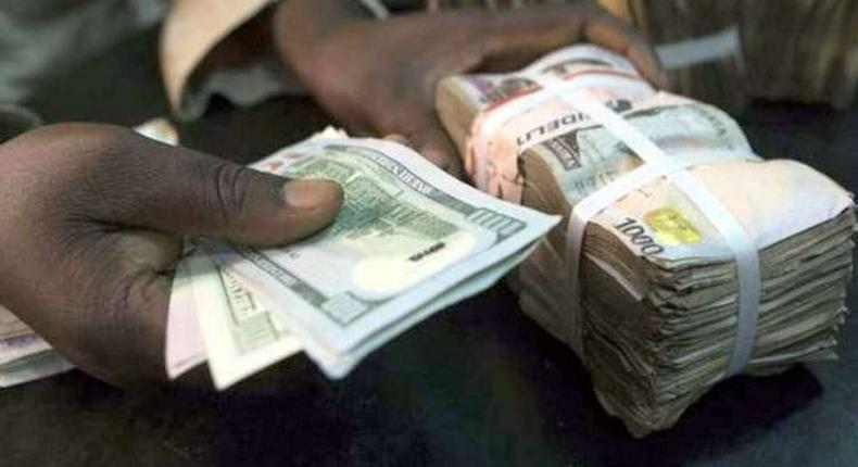 Naira gains against dollar by 0.03%.