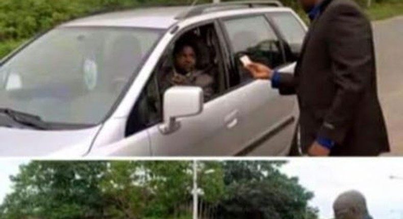 Governor Ayo Fayose spotted in suit on the streets checking motorists drivers license