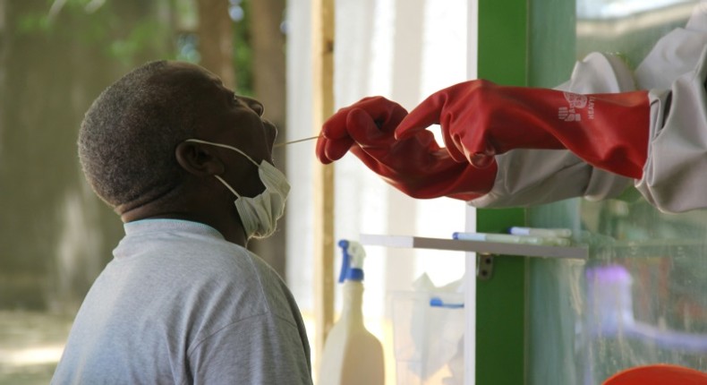 COVID-19 testing takes place at the University of Maiduguri Teaching Hospital in Nigeria. [AFP]