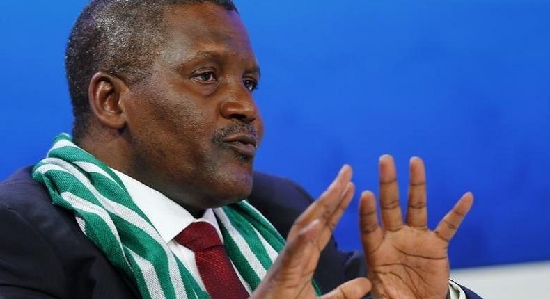 Aliko Dangote, President and Chief Executive Officer of Dangote Group and Co-Chair of the World Economic Forum (WEF) Annual Meeting 2014, speaks during a session at the WEF  in Davos January 22, 2014.  REUTERS/Denis Balibouse