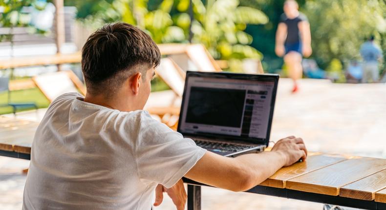 A California-based millennial secretly worked two remote jobs and it gave him the confidence to start his own business. Worker in the story not pictured.Urbazon / Getty Images