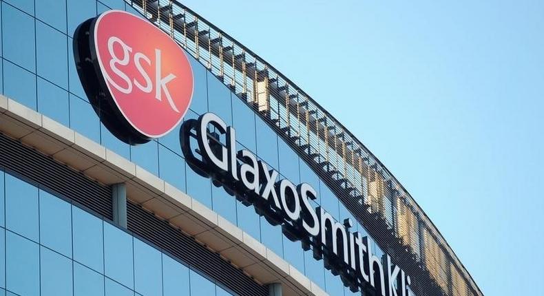 A GlaxoSmithKline logo is seen outside one of its buildings in west London, February 6, 2008. REUTERS/Toby Melville/File Photo