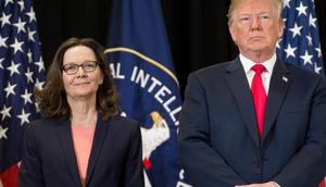 Donald Trump stands alongside Gina Haspel before she is sworn-in as Director of the Central Intelligence Agency during a ceremony at CIA Headquarters in Langley, Virginia, May 21, 2018.