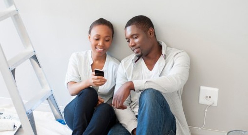 Couple looking a phone