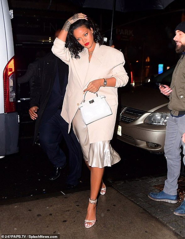 Rihanna steps out in silky skirt and oversized blazer for night out in New York 