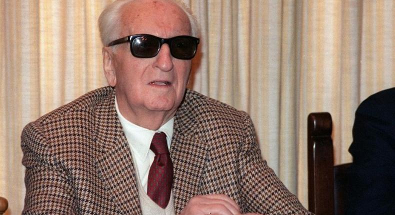 Formula One legend Enzo Ferrari, pictured in March 1987, is buried in a cemetery in Modena behind a plate of marble in a large chapel secured by a heavy iron gate
