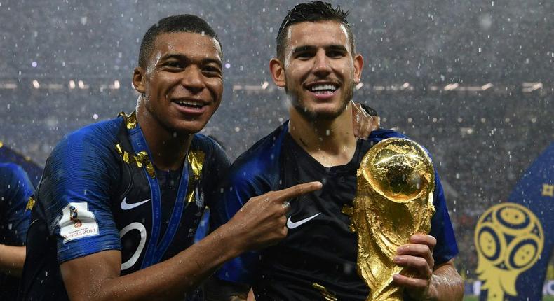 Lucas Hernandez (right) with Kylian Mbappe after winning the World Cup in 2018 Creator: FRANCK FIFE