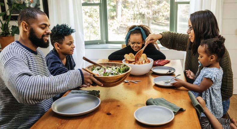 Gathering around the table can help foster healthy attitudes about food.The Good Brigade/Getty Images