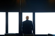 Republican U.S. presidential nominee Donald Trump looks out at Lake Michigan during a visit to the M