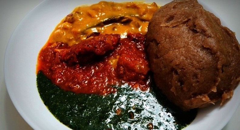 A plate of amala and ewedu soup