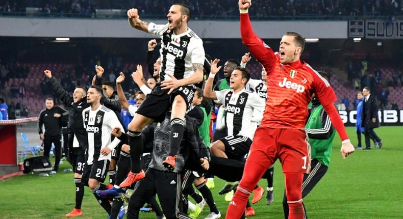 Juventus all-but-sealed their eighth straight Serie A title after winning 2-1 at Napoli to go 16 points clear at the top