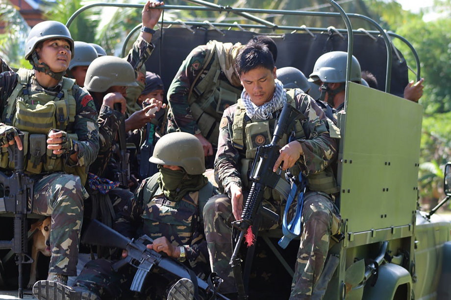Reinforcements head to an area where gunmen engaged government troops in the town of Clarin, Bohol province, April 2017.