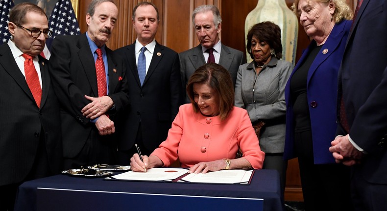 pelosi signs articles of impeachment