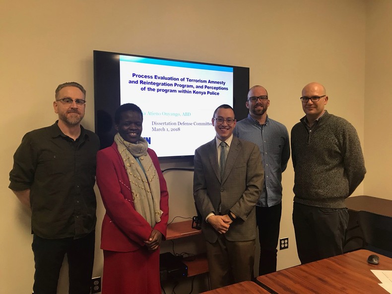  Dr Resila Atieno Onyango with her lecturers at the City University of New York