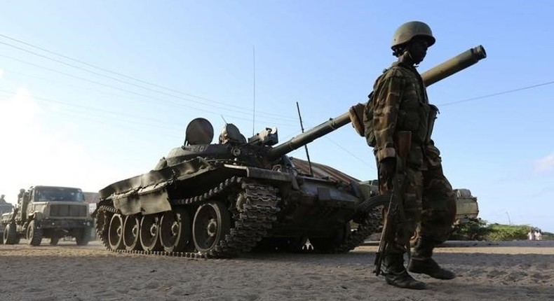 Somalia's army soldiers and peacekeepers from the African Union Mission in Somalia (AMISOM) enter the town of Barawe during the second phase of Operation Indian Ocean October 6, 2014. 