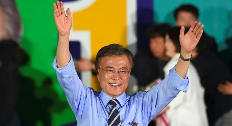 Pro-democracy activist Moon Jae-In, the projected winner of South Korea's presidential election shown at a campaign rally, backs engagement with the nuclear-armed North