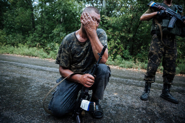 Ukraiński żołnierz w pobliżu miasta Gorłówka. Fot. EPA/ROMAN PILIPEY/PAP