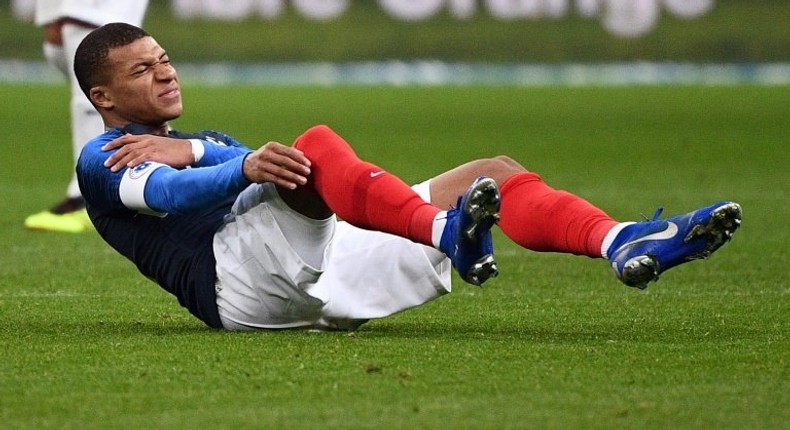 Kylian Mbappe hurt his shoulder in a heavy fall as France beat Uruguay