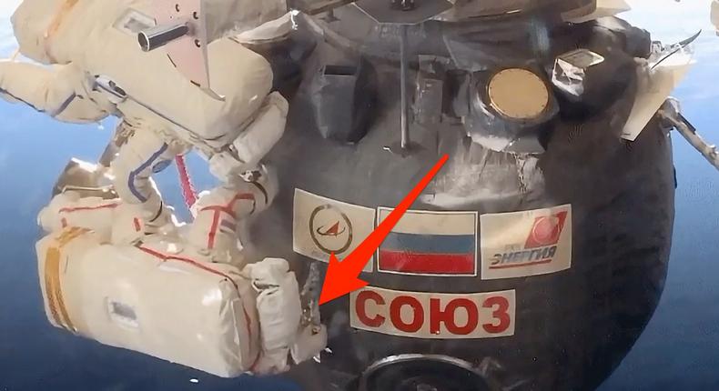 Cosmonauts used a knife to locate a hole in a Russian Soyuz spacecraft on Tuesday.