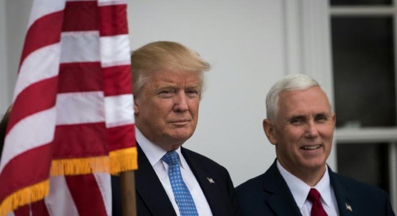 President-elect Donald Trump (L) and vice president-elect Mike Pence will visit an air conditioning plant in Indiana which he repeatedly leaned on in public not to ship a planned 2,000 jobs to Mexico