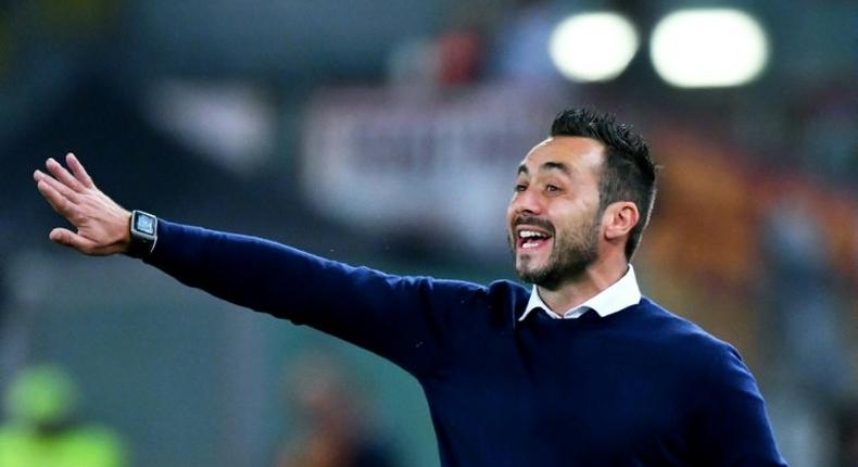 Palermo's Italian coach Roberto De Zerbi gestures during the Serie A match between AS Roma and Palermo at the Olympic stadium in Rome on October 23, 2016