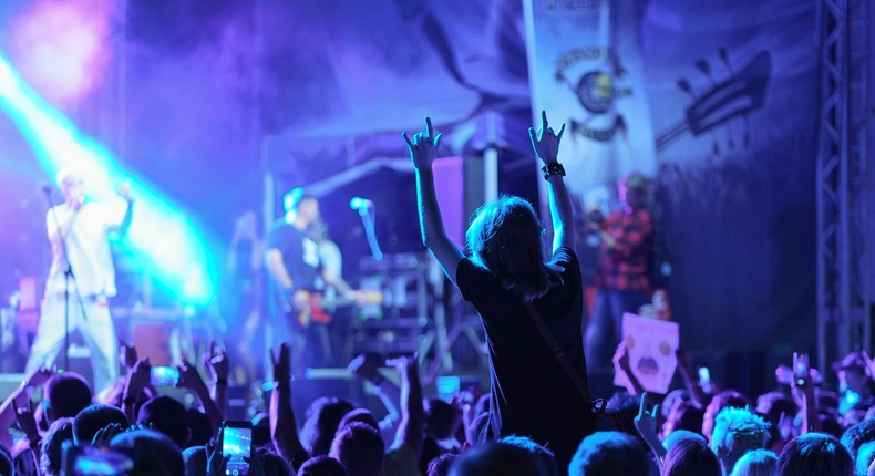 Stock image of people dancing during a street rock concert in Kaliningrad, Russia.Getty Images