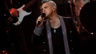 Robbie Williams: świętowałem w Polsce sukces kiełbasą i frytkami