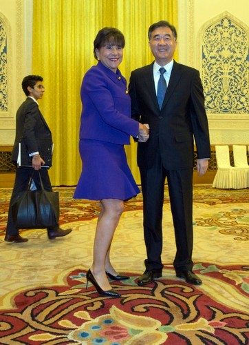 Penny Pritzker i Wang Yang