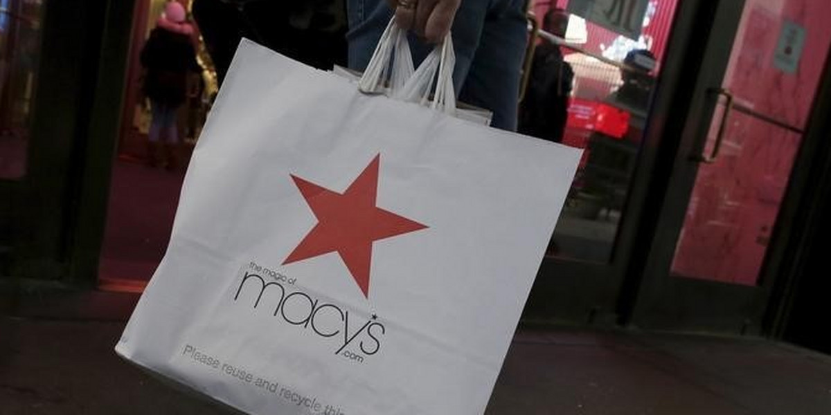 A customer exits the Macy's flagship department store in midtown Manhattan in New York City
