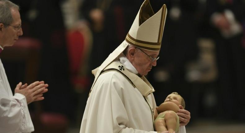 Pope Francis urged the world's 1.2 billion Catholics to feel compassion for children, notably victims of war, migration and homelessness in his Christmas Eve mass