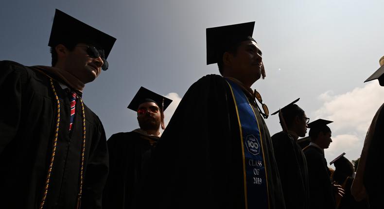 College graduates.Robyn Beck/AFP via Getty Images