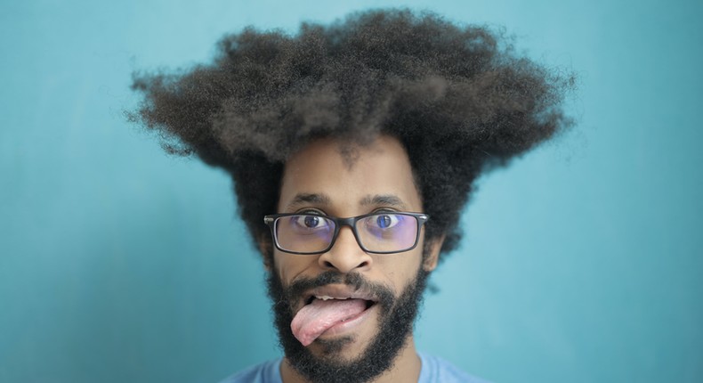 A young man with shaggy hair