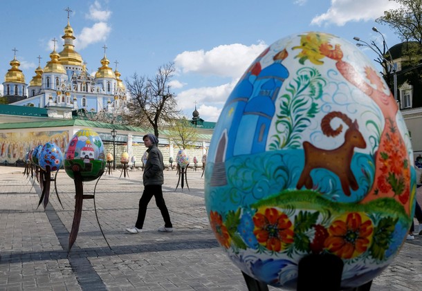 Visitor looks at traditional Ukrainian Easter eggs Pysanky, displayed at square, as part of upcomi