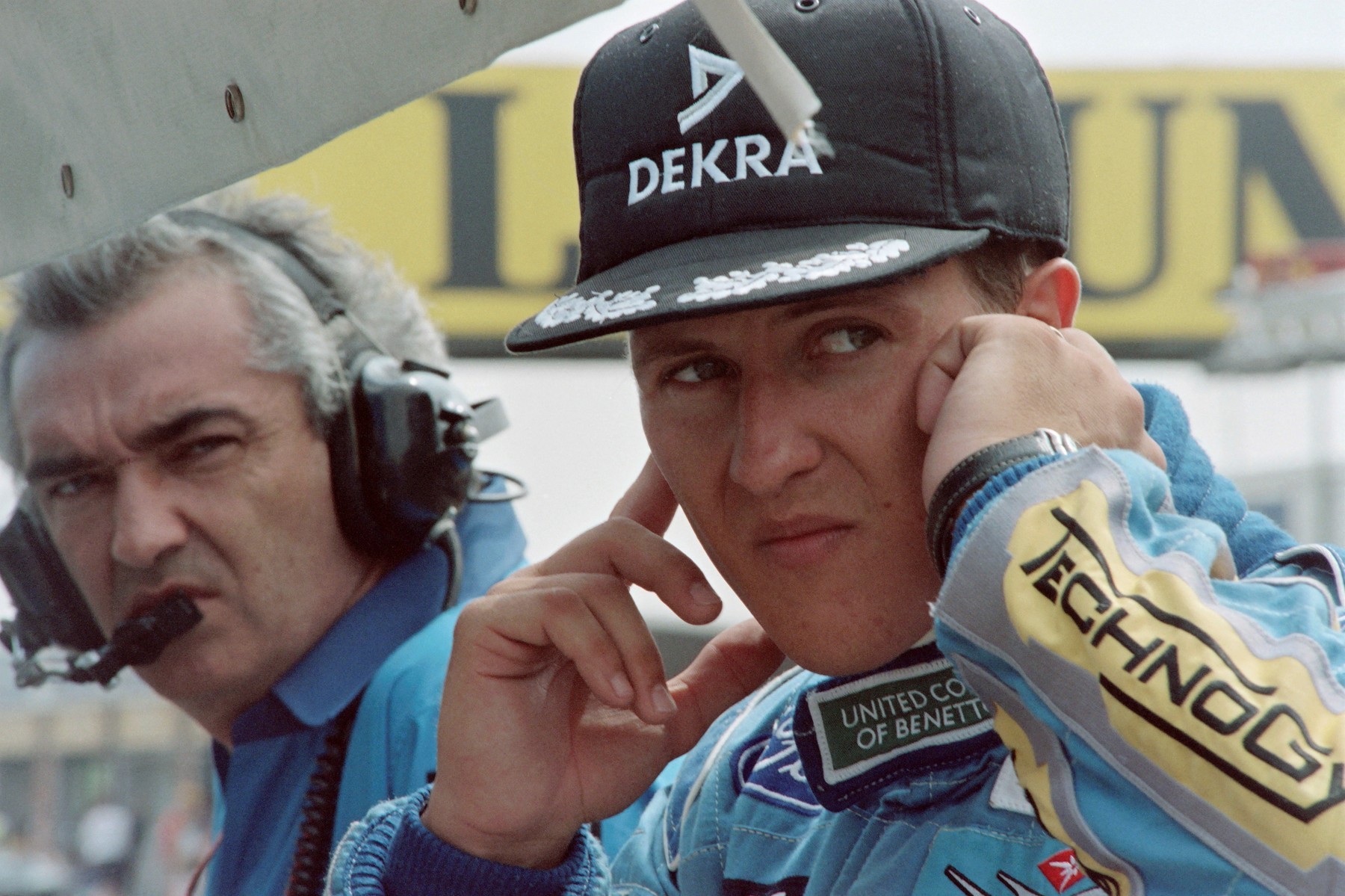 Nemecký jazdec F1 Michael Schumacher vedľa manažéra Flavia Briatoreho.
