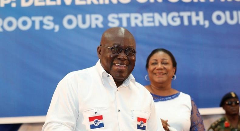 President Nana AKufo-Addo and wife Rebecca in the background.