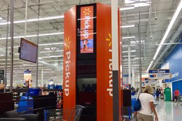 Walmart is rolling out its massive online pickup towers to 500 stores