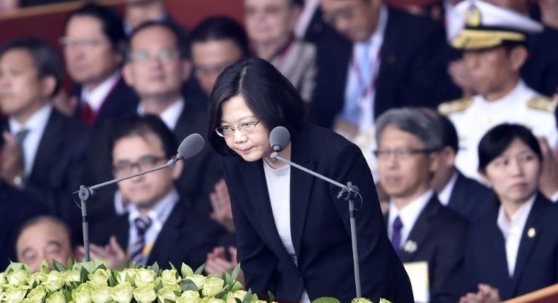 China has called on Washington to block Taiwan President Tsai Ing-wen (C) passing through the US en route to Central America next month