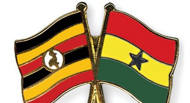 Flag pins of Uganda and Ghana