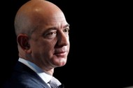 FILE PHOTO: Jeff Bezos, founder of Blue Origin and CEO of Amazon, speaks about the future plans of B