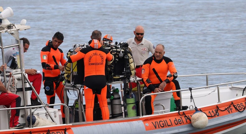 Divers prepare to search for the missing after the superyacht called the Bayesian sunk off the coast of Italy.Anadolu/Getty Images