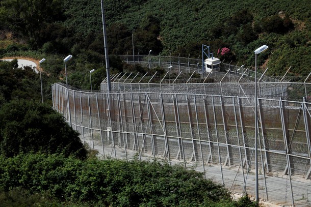 The border fence separating Spain's northern enclave Ceuta and Morocco is seen from Ceuta