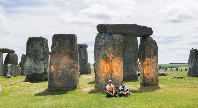 Two climate protesters with Just Stop Oil were arrested after spraying orange paint on Stonehenge.Just Stop Oil