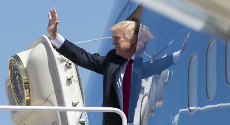 US President Donald Trump waves as he boards Air Force One for a trip last month. His first trip abroad will include six stops in the Middle East and Europe